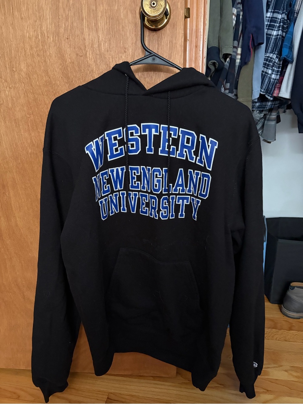 Champion Black Hoodie with Blue Western New England University Lettering
